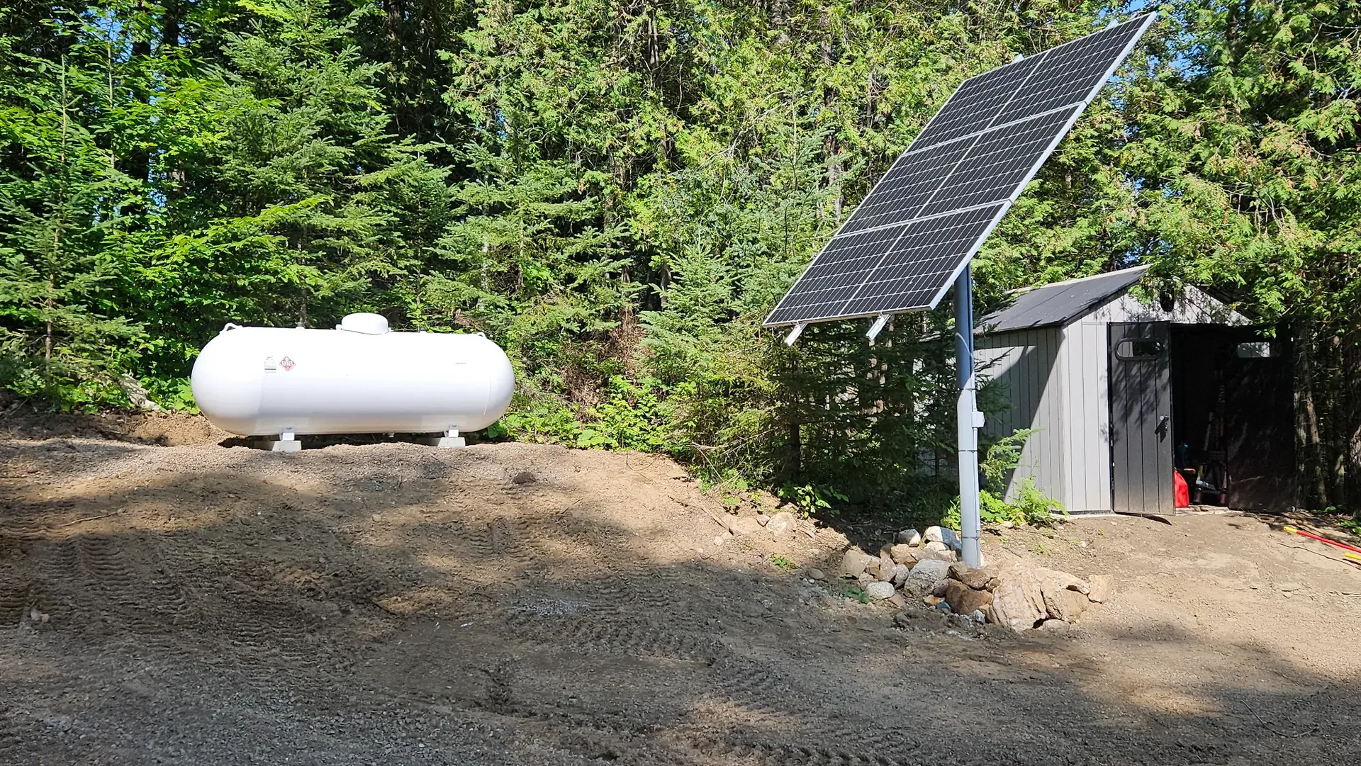 Off-grid solar, battery, and generator equipment illustrating connected rural property systems